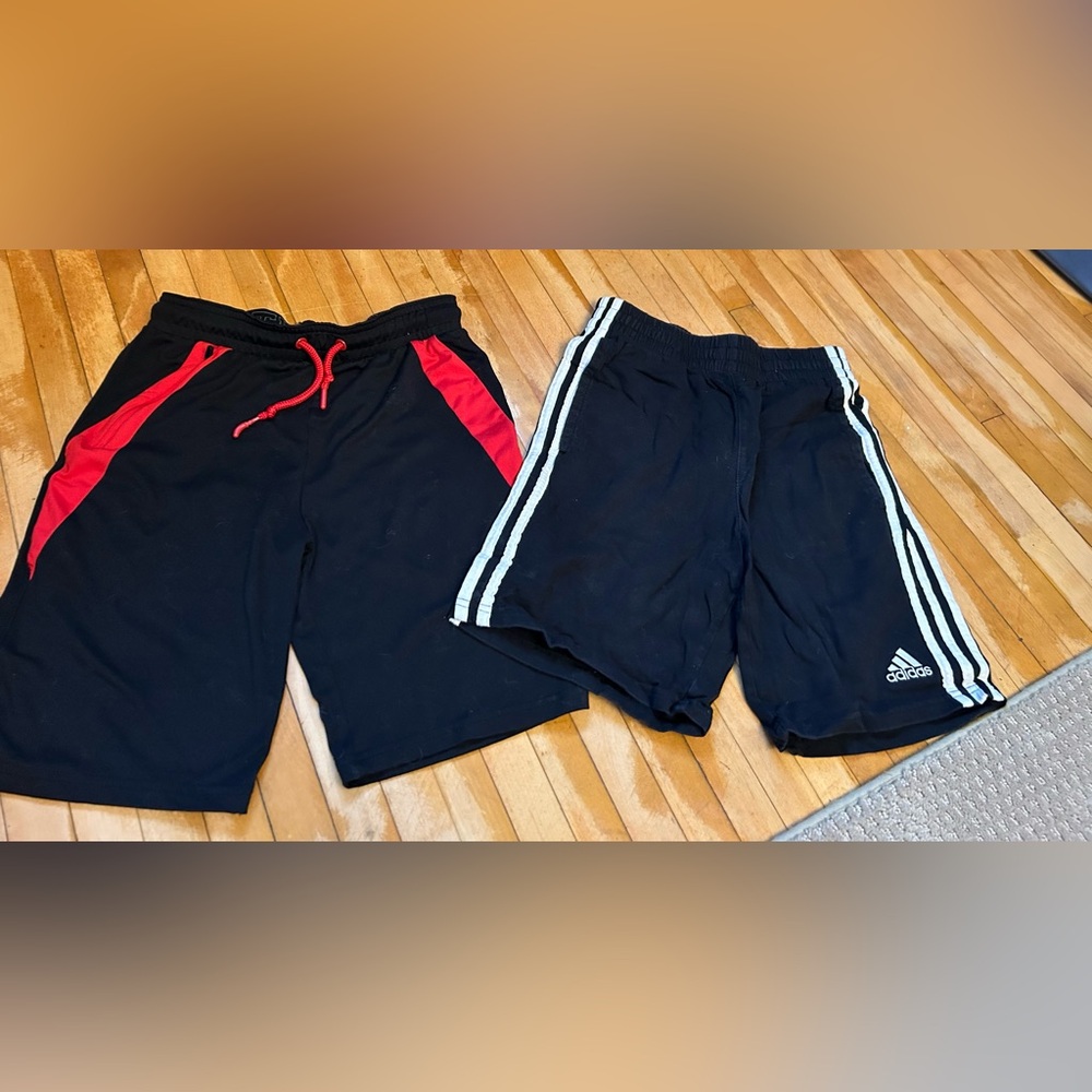 2 pair of kids size Medium shorts.  One is Adidas, one is off brand.